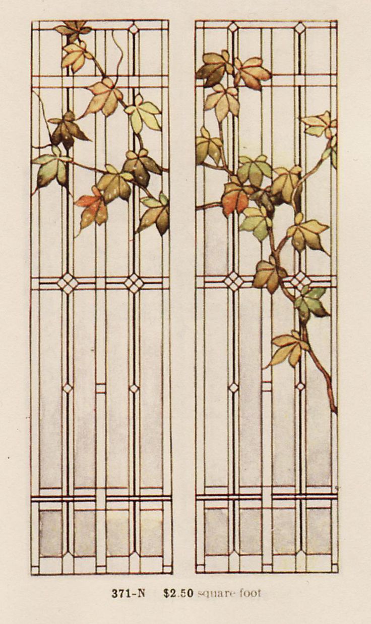 two stained glass windows with leaves on them