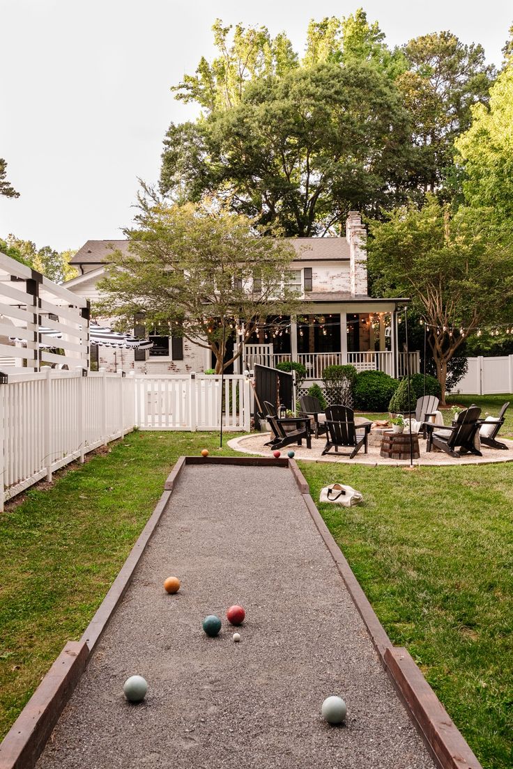 an outdoor bowling alley in the back yard