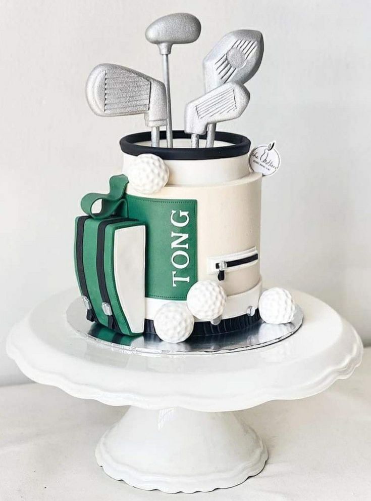 a birthday cake with golf related items on it