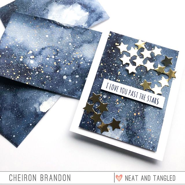 two cards with gold stars on them, one is blue and the other is white