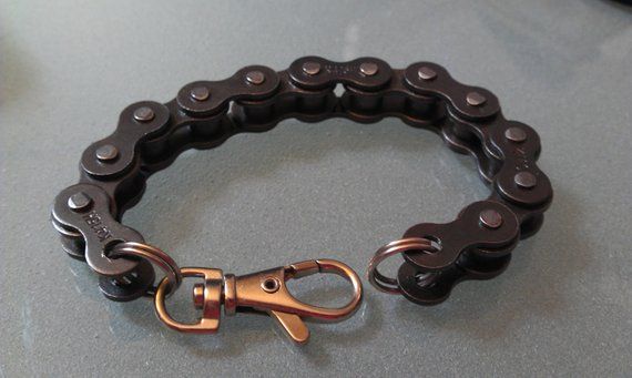 a close up of a bike chain on a table