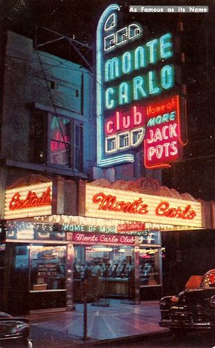 the neon sign for monte carlo club and jack pot's in new york city