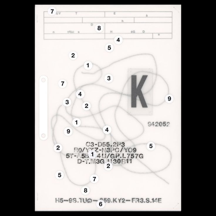 the back side of a white paper with numbers and symbols on it, including one letter k