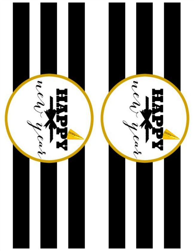 two black and white striped stickers with the words happy new year on them