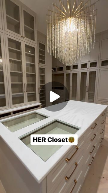 a white counter top sitting inside of a kitchen