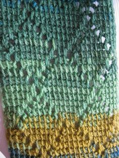 there is a green and yellow knitted scarf