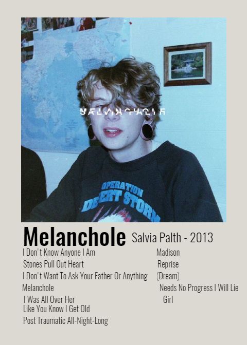 the poster for melanchole is displayed in front of a wall with pictures on it