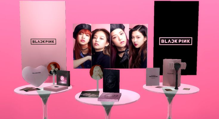 three tables with various items on them and one has an image of blackpink