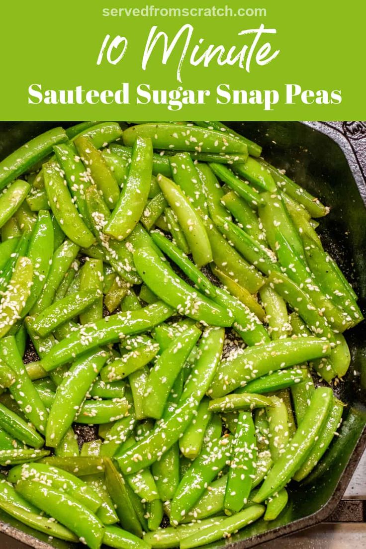 sugar snap peas in a skillet with sesame seeds on top and green beans below