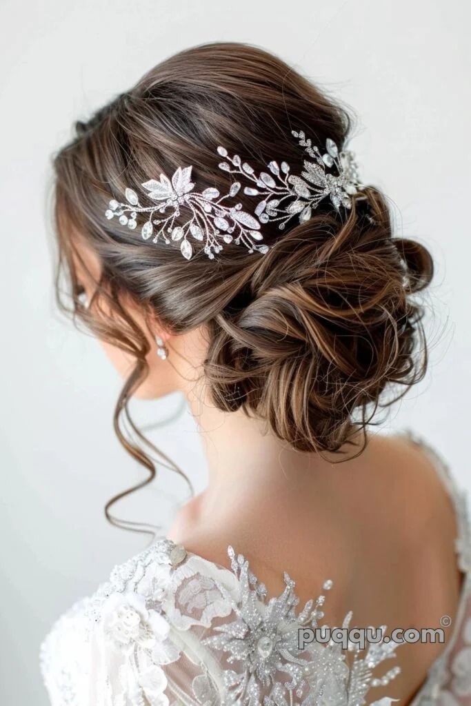 a woman wearing a wedding hair comb with flowers on it