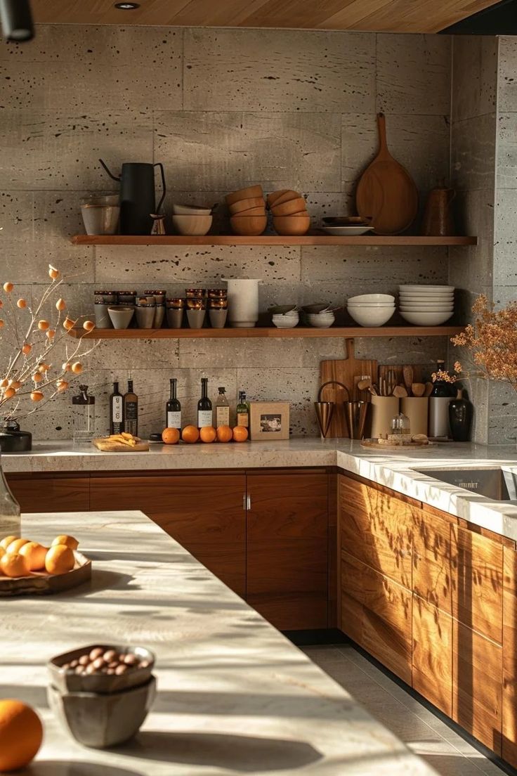 a kitchen with wooden cabinets and shelves filled with dishes on top of the counter tops