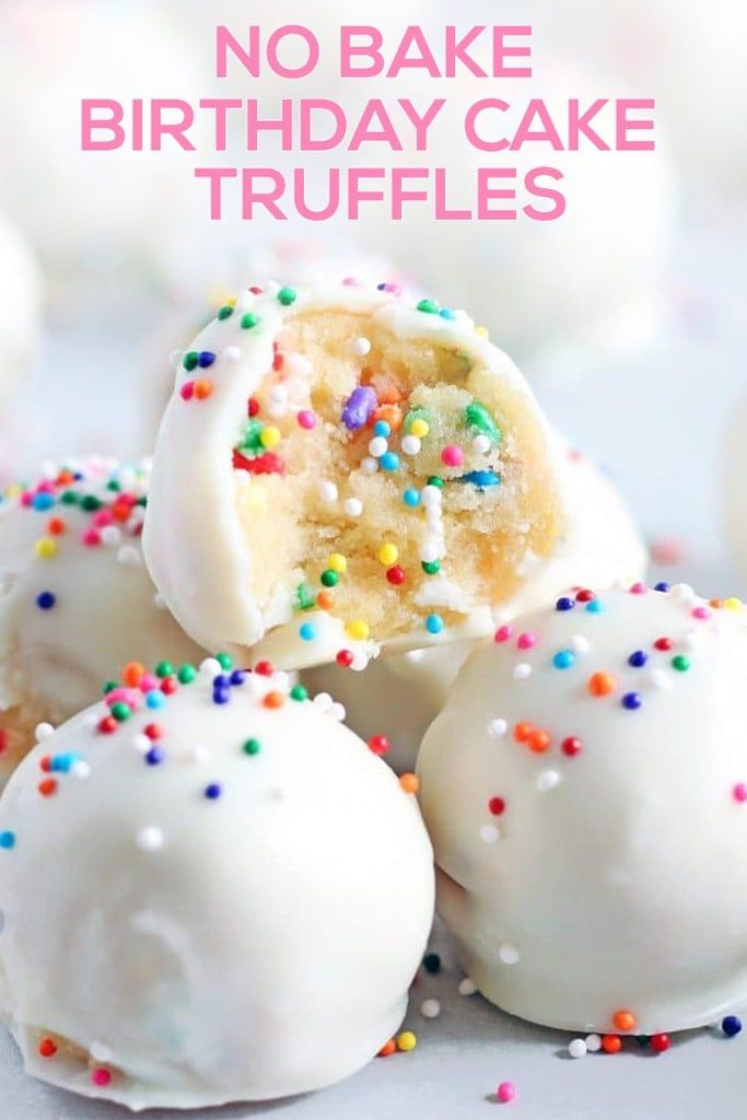 white cake truffles with sprinkles on them