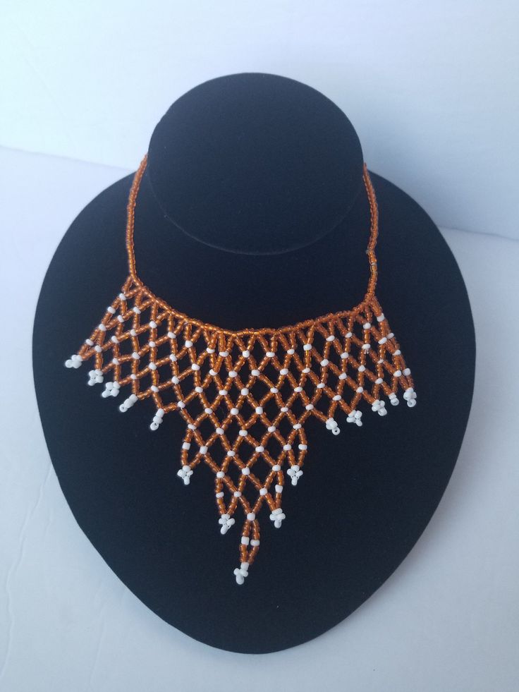 Hand crafted with beads and a wire. The triangle choker necklace fits perfectly around the neck. The beads are shiny and elegant. Can be worn for many occasions. Thanks for visiting my shop. Come again Stay safe https://www.etsy.com/shop/naistumityujewelry Adjustable Triangle Beaded Jewelry, Adjustable Triangular Beaded Jewelry, Necklace African, Multi Strand Beaded Necklace, Purple Gift, Triangle Necklace, Beaded Collar, Best Gifts For Her, The Triangle