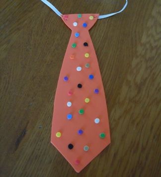 a tie made out of plastic beads on a table