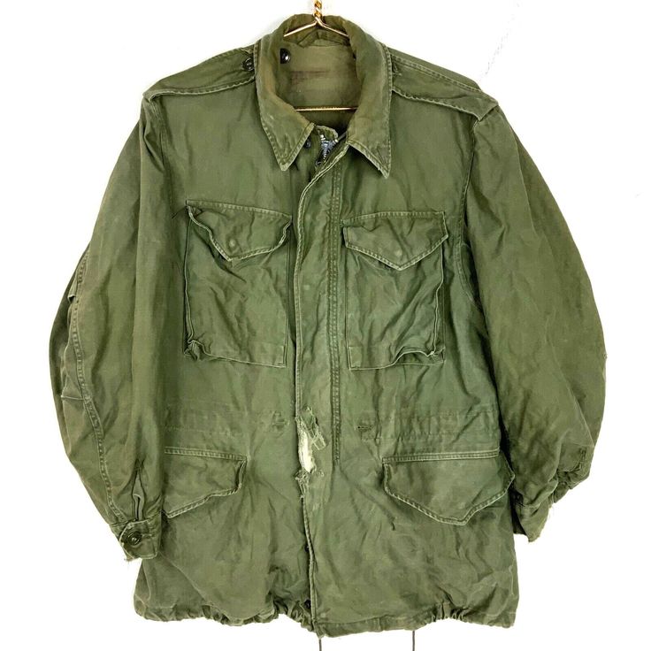 Vintage Military Og 107 Jacket Lined Size Small Green Distressed Vietnam Era 70s Size/Measurements (Based in inches) Size - Small Pit to pit - 22" Length - 30" Shoulder to cuff - 23" Condition / Details Vintage fading to the original color of the fabric Missing tag Distressing on front, both sleeves and on neck lining Stains on neck lining and on back Discoloration on neck lining, on back and on both sleeves Combined Shipping: We provide combined shipping, please contact us for a quote Vintage Green Utility Jacket For Fall, Vintage Khaki Parka For Fall, Retro Fall Parka With Pockets, Retro Green Utility Jacket For Fall, Vintage Khaki Fall Outerwear, Vintage Khaki Utility Jacket For Spring, Vintage Long Sleeve Parka For Fall, Vintage Green Utility Jacket For Outdoor, Vintage Fall Parka With Pockets