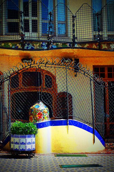 The vibrant colours of Casa Batllo in Barcelona, Spain, designed by Antoni Gaudi, are a stunning dis Wall Art Architecture, Barcelona Architecture, Antonio Gaudí, Casa Batlló, Catalonia Spain, Antoni Gaudi, Barcelona Travel, Teak Frame, Roof Top