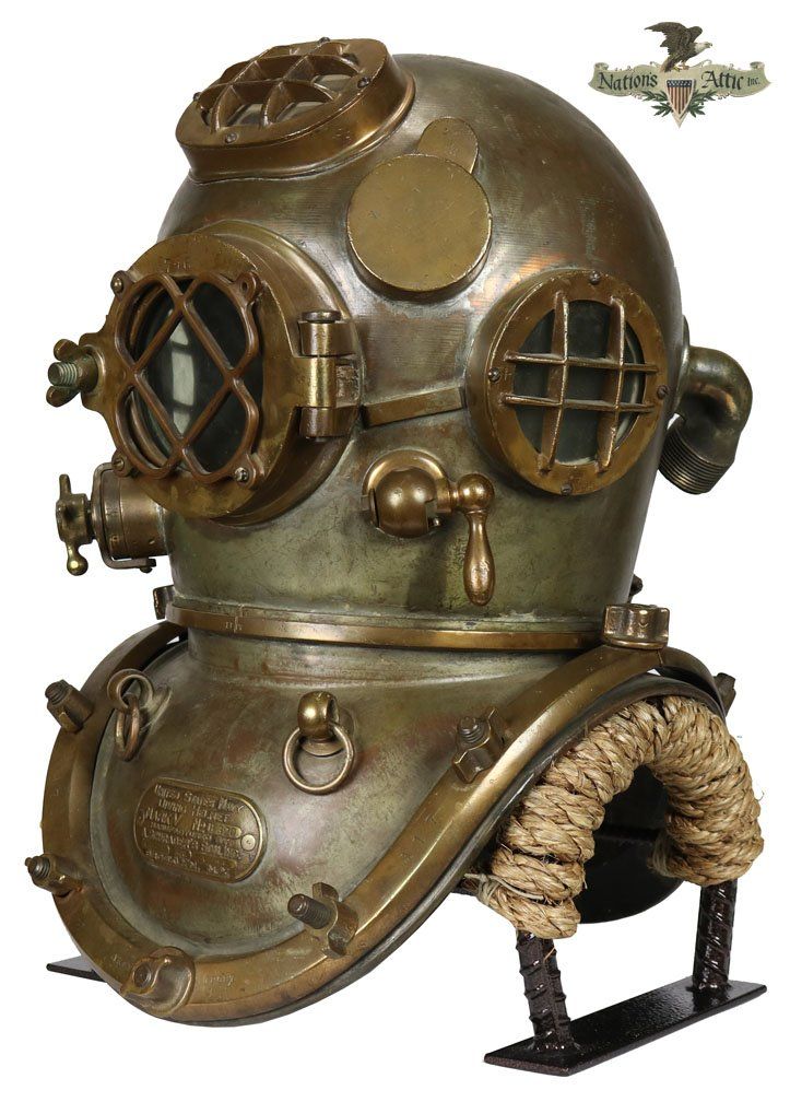 an old diving helmet is on display