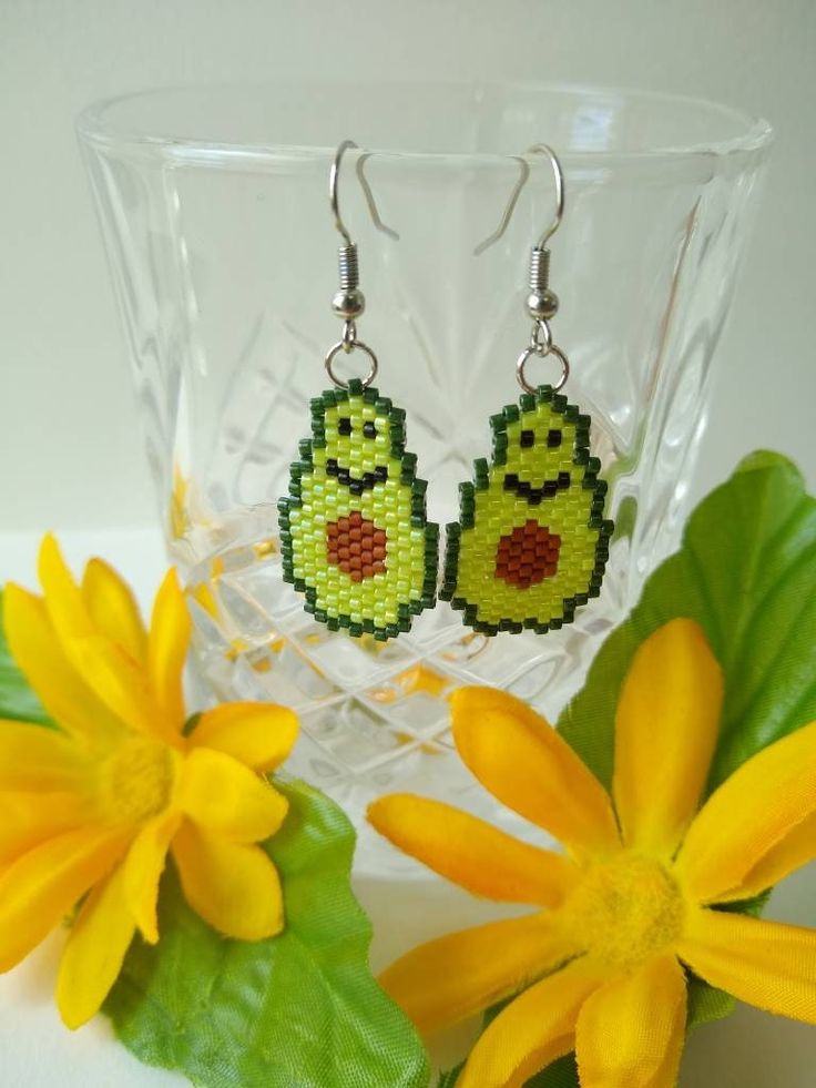 These cute earrings are great for a gift or to keep for yourself! Glass beads delicately threaded with nylon beading thread.  Free Shipping! All orders sanitized before shipping! Please feel free to contact me with any questions! Green Fun Beaded Earrings For Gift, Fun Green Beaded Earrings For Gift, Handmade Adjustable Fun Beaded Earrings, Handmade Green Beaded Earrings, Fun Beaded Earrings For Gifts, Handmade Fun Beaded Earrings For Gifts, Green Beaded Fun Earrings, Fun Handmade Dangle Beaded Earrings, Fun Handmade Beaded Dangle Earrings