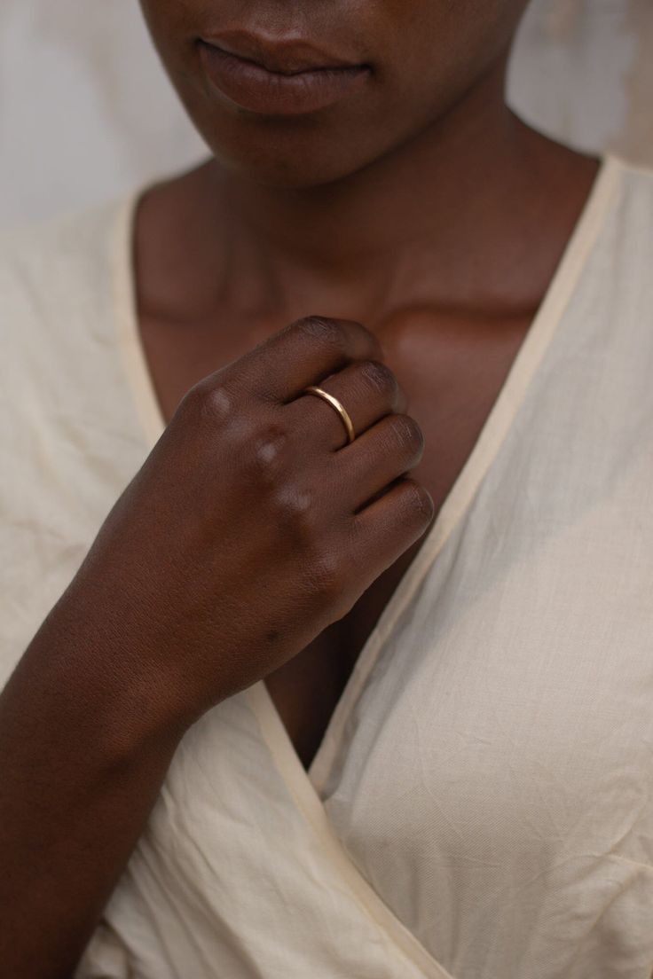 14k recycled gold-plated brass Nickel & lead free Crafted using responsibly sourced and recycled metals Handmade in a solar-powered workshop in rural Malawi The 'Chalu' Ring (meaning 'natural earth' in Tumbuka) is crafted with a wabi-sabi organic design in mind, giving it a rustic, natural feel. The irregular beauty is sure to make a statement, perfect for a special occasion or everyday wear. Crafted from brass coated in a luxuriously thick layer of 14k recycled gold to ensure both longevity and Gold Midi Rings Of Recycled Gold, Everyday Gold Brass Midi Rings, Everyday Gold Midi Rings Made Of Recycled Gold, Everyday Gold Stackable Brass Rings, Gold Handmade Stackable Promise Rings, Handmade Gold Stackable Promise Rings, Everyday Heirloom Jewelry In Recycled Gold, Heirloom Style Recycled Gold Jewelry For Everyday, Heirloom Recycled Gold Jewelry For Everyday