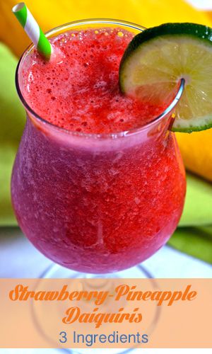 strawberry pineapple daiquisins in a glass with lime on the rim and text overlay that reads, strawberry pineapple daiquiins 3 ingredients