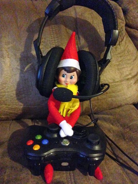 an elf with headphones is playing video games