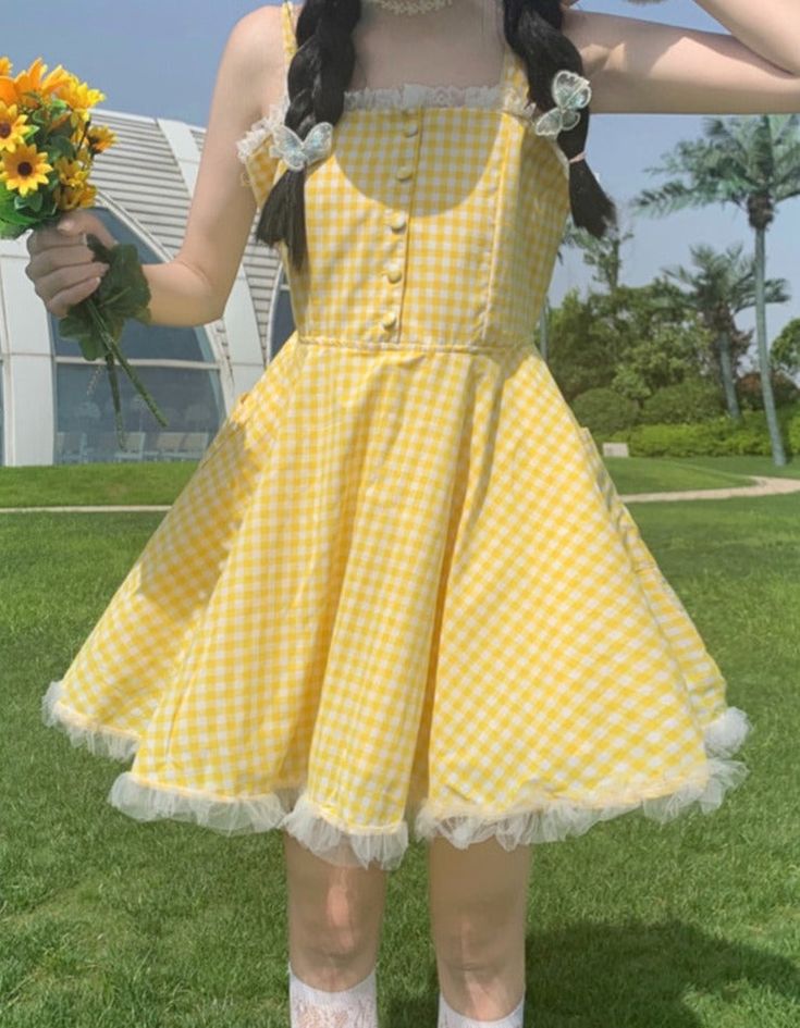 🌞 Step into Sunshine with Our Yellow Plaid Picnic Dress! 🌼👗 🌼 Cheerful and Chic: Our Yellow Plaid Picnic Dress is designed for those who appreciate the brightness of sunshine and want to radiate style effortlessly. Ideal for individuals who love to blend a touch of happiness with fashion. ✨ Superior Quality: Crafted with precision to ensure top-notch quality and style. This dress is designed to keep you looking both joyful and confident, whether you're out for a picnic or a casual outing. 💫 Summer A-line Sundress For Picnic, Cute A-line Sundress For Garden Party, Cottagecore Ruffled Summer Dresses, Cute Spring Mini Dress For Picnic, Cute Gingham Dresses For Day Out, Cotton Sundress For Spring Picnic, Yellow Sundress For Summer Picnic, Vintage Mini Dress For Spring Picnic, Yellow Summer Picnic Sundress