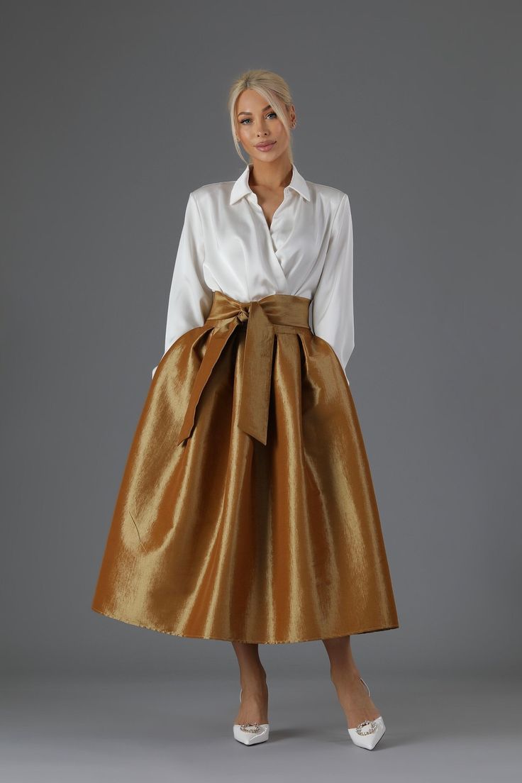 Taffeta skirt with sash included. Skirt has a pockets. Taffeta skirt makes a classical elegant look. This skirt is perfect for any occasion.  Waistline can be made wider or more narrow. Skirt can be made longer or shorter.  More skirts you can see here:  https://www.etsy.com/shop/DesirCouture?ref=seller-platform-mcnav&section_id=40312230 Skirt length 31.5 inches / 80 cm.  In order's note you can write your waist measurements and I will make according to your size. Standard Waist sizes: XXS 24.5 Couture Bridesmaid Dresses, Taffeta Skirt, Gown Skirt, Wedding Skirt, Classic Skirts, Womens Skirts, Formal Skirt, Ball Gown Skirt, Skirt For Women