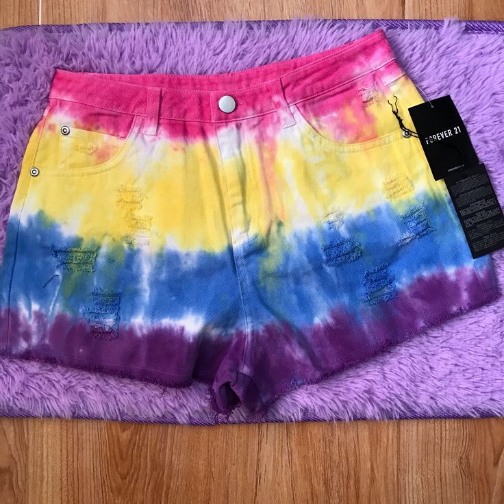 Brand New With Tags On Original Packaging. Rainbow Tie Dye Shorts Size 26. For Pic Reference, I Usually Wear Size 24 And These Are Big On Me. Tags: Tiedye, Tie-Dye, Psychedelic, Trippy Groovy, Waist Bag, Festival, Coachella, Ravewear, Rave, Tiedye, Tie Dye, Dollskill, J Valentine, Little Black Diamond, Handbag, Bag, Lsd, Acid, Backpack, Hologram_babe Trendy Colorful Vacation Bottoms, Trendy Multicolor Summer Shorts, Trendy Colorful Summer Bottoms, Colorful Spring Bottoms For Summer, Forever 21 Shorts For Summer Day Out, Multicolor High-waisted Shorts For Beach Season, High Waist Multicolor Shorts For Beach Season, Yellow High Waist Cotton Jean Shorts, Colorful Cotton Bottoms For Summer