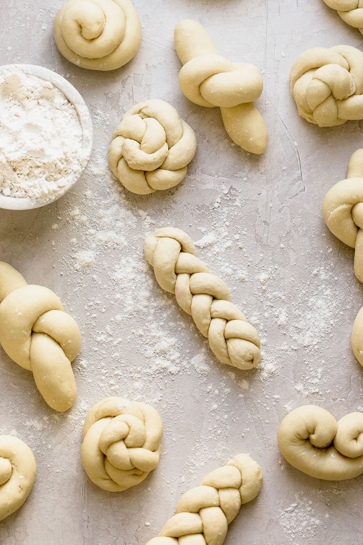 doughnuts are lined up and ready to be baked