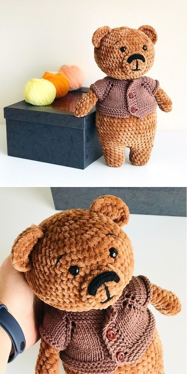 the crochet teddy bear is wearing a sweater