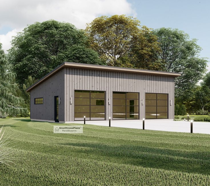 an image of a two car garage in the middle of a field with trees and grass