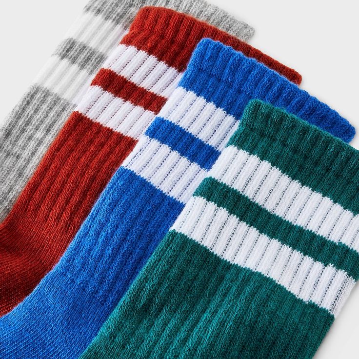 This Boys' 4pk Striped Crew Socks - Cat & Jack™ makes a cozy addition to your kid’s everyday wardrobe. Crafted from a soft knit fabric with spandex for stretchy comfort, these ankle socks are easy on the feet for prolonged wear. The pack includes four pairs in solid multi color neutrals giving you plenty of options for pairing with their everyday outfits. Cat & Jack™: Designed for all children so you can trust it's made for yours. Casual Winter Socks For School, Casual Multicolor Soft Socks, Casual Soft Multicolor Socks, Casual Cotton Socks For Playtime, Multicolor Casual School Socks, Casual Multicolor School Socks, Space Socks, Cat Socks, Kids Clothes Boys