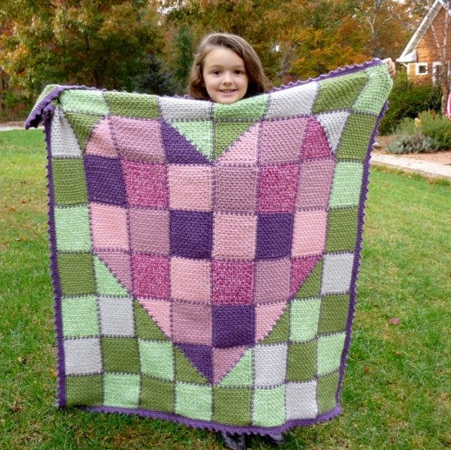 Show your love with this adorable quilt look Made with Love, Heart Baby Blanket. Not just for baby! Any child or teen would love this throw on her bed. Also great as an engagement, wedding or anniversay gift or a lapghan for the older generation. Pattern written for Vanna's Choice yarn but any worsted weight yarn will work. Great stash buster as most colors use only one or two skeins. Get creative, mix and match your leftover yarn and turn it into something beautiful (important, do not mix wool Heart Baby Blanket, Crochet Heart Blanket, Patchwork Crochet, Crocheted Afghans, Blanket Bedspread, Frog Hat, Crochet Hearts, Heart Blanket, Patchwork Heart