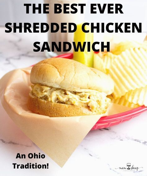 the best ever shredded chicken sandwich in a basket with chips