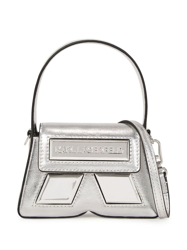 silver-tone calf leather metallic finish silver-tone logo plaque single top handle adjustable detachable shoulder strap foldover top with magnetic fastening main compartment internal logo patch Silver Shoulder Bag With Silver-tone Logo For Formal Events, Formal Silver Shoulder Bag With Logo Plaque, Metallic Silver Evening Bag With Logo Plaque, Leather Evening Bags With Metallic Logo, Evening Silver Bag With Logo Hardware, Silver Evening Bag With Logo Hardware, Silver Evening Bag With Metal Logo, Evening Silver Bags With Logo Hardware, Formal Silver Shoulder Bag With Logo Hardware