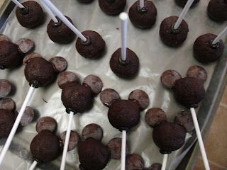 chocolate donuts are being cooked on the grill with toothpicks sticking out of them