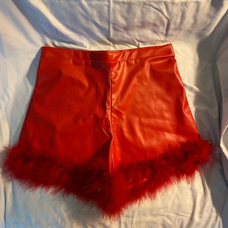 Nwt Pleather Shorts With Feather Trim Size Medium And Large Available Medium Waist Measures 13.5” Across Large Waist Measures 14” Across Feather Trim Retails $30 Trendy Red Club Bottoms, Trendy Red Bottoms For Club, High Waist Red Bottoms For Club, Red Party Bottoms In Short Length, Red Party Bottoms Of Short Length, Red Short Length Bottoms For Party, Chic Red Leather Bottoms, Red High-waisted Shorts For Party, High Waist Leather Party Bottoms