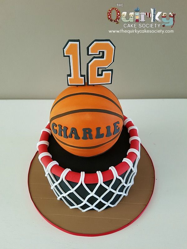 a birthday cake made to look like a basketball