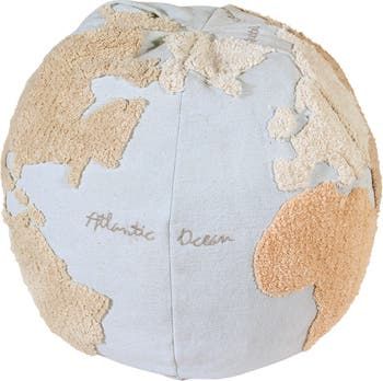 a blue and beige earth pillow with words written on the side, in front of a white background