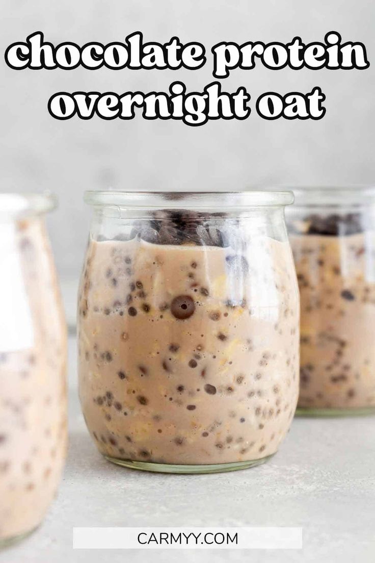 three jars filled with chocolate protein overnight oat