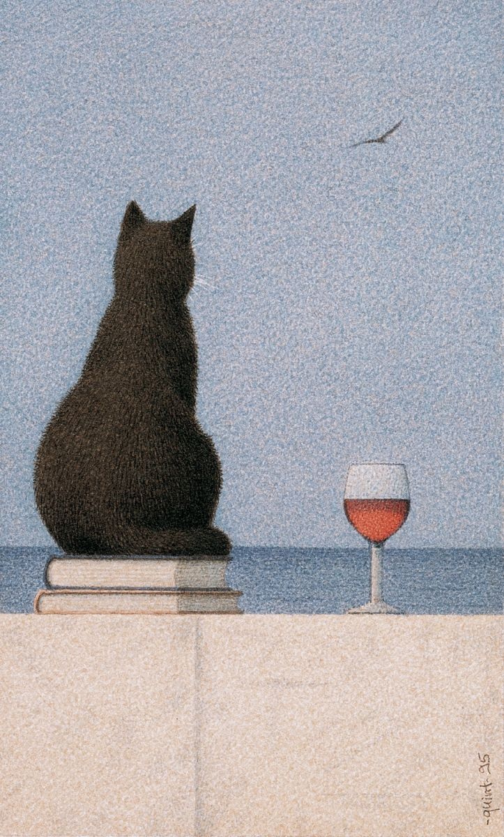 a cat sitting on top of a white wall next to a glass of red wine