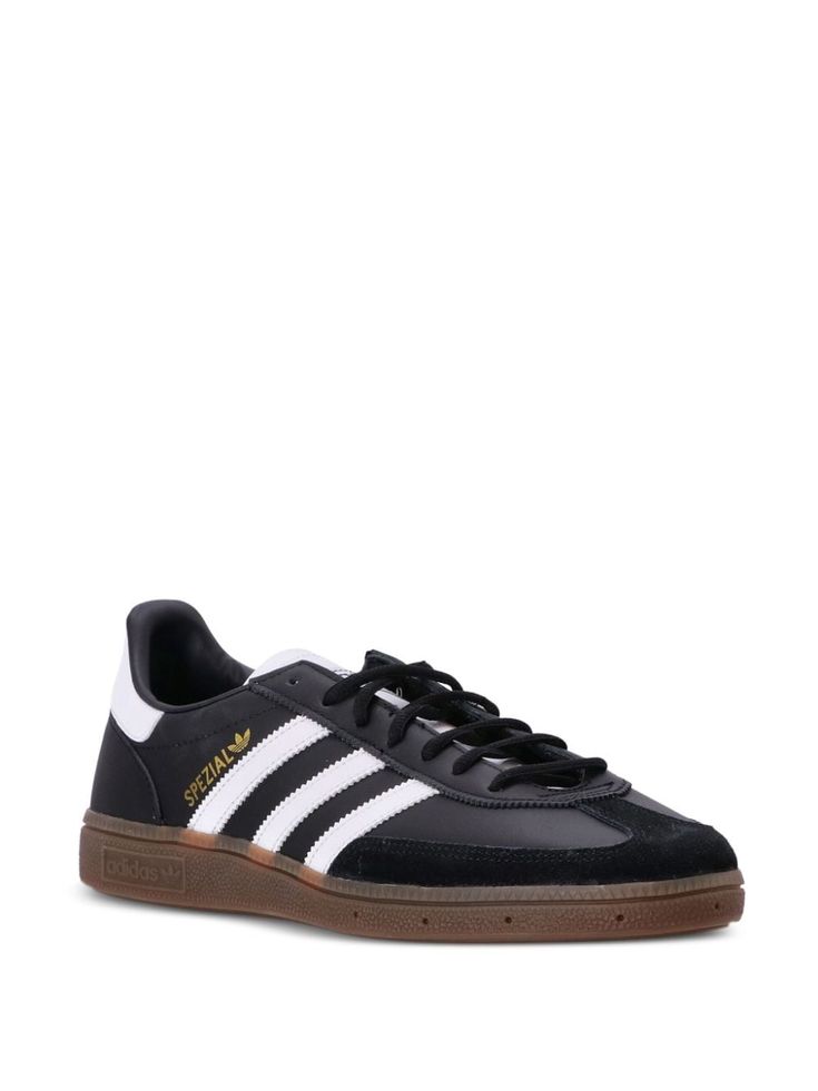 Find ADIDAS Handball Spezial Lace-up Trainers on Editorialist. black/white calf leather suede panelling logo print to the side logo patch at the tongue side stripe detailing front lace-up fastening branded insole rubber sole Leather High-top Sneakers With Three Stripes Branding, Leather Lace-up High-top Sneakers With Three Stripes Branding, Adidas Leather High-top Sneakers With Three Stripes, Adidas Leather Sneakers With Three Stripes, Classic Adidas Leather High-top Sneakers, Black Suede Adidas Sneakers, Leather Sneakers With Three Stripes For Streetwear, Adidas Leather Skate Shoes With Three Stripes, High-top Leather Skate Shoes With Three Stripes Branding