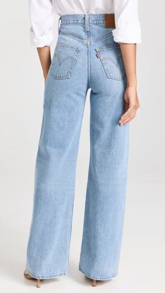 Levi's Ribcage Wide Leg Jeans | Shopbop Casual Cotton Flare Jeans With Zip Fly, Spring Medium Wash Flare Jeans With Zip Fly, Spring Denim Flare Jeans, Spring Flare Jeans With Zip Fly, Spring Denim Flare Jeans With Zip Fly, Spring Everyday Flare Jeans With Pockets, Casual High Rise Flare Jeans With Zip Fly, Spring Full-length Jeans With Button Closure, Spring Jeans With Button Closure