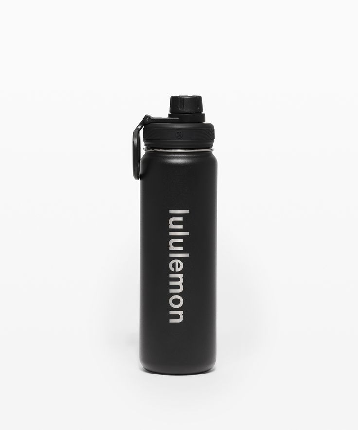 a black water bottle sitting on top of a white surface with the word unknown printed on it