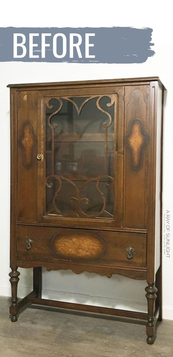 an old china cabinet with the words before painted on it