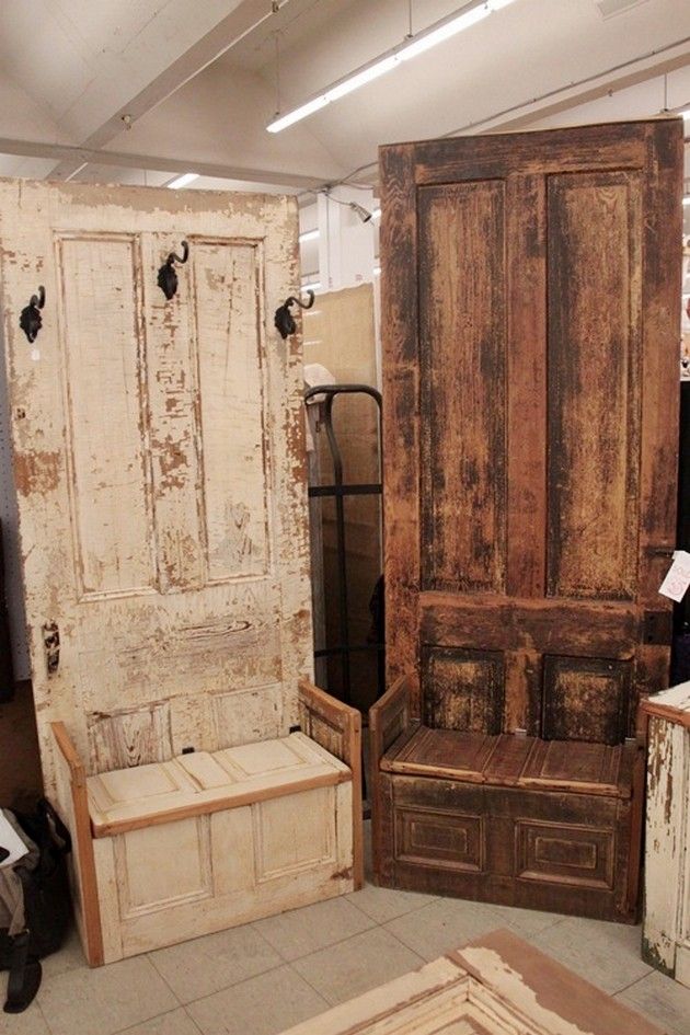 an old door and some wooden furniture in a room that is being advertised for sale