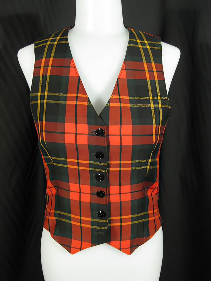 "Early 1970s wool plaid vest by Anne Klein with the Lion head label. A timeless style in a classic plaid and perfectly detailed, the vest is about a size 2. It measures approx. 11\" across the shoulders, 32\" bust, 26\" waist, 20\" length to the point ends in front, and 18 1/2\" length in back. It's in excellent, like new, condition. See my entire shop collection here https://www.etsy.com/shop/RobinClaytonVintage" Classic Plaid Vest For Fall, Classic Plaid Vest, Classic Plaid Sleeveless Vest, Classic Sleeveless Plaid Vest, Vintage Vest For Tailoring In Fall, Vintage Tailored Vest For Fall, Vintage Vest For Fall Tailoring, Plaid Vest For Fall, Plaid Sleeveless Vest For Fall