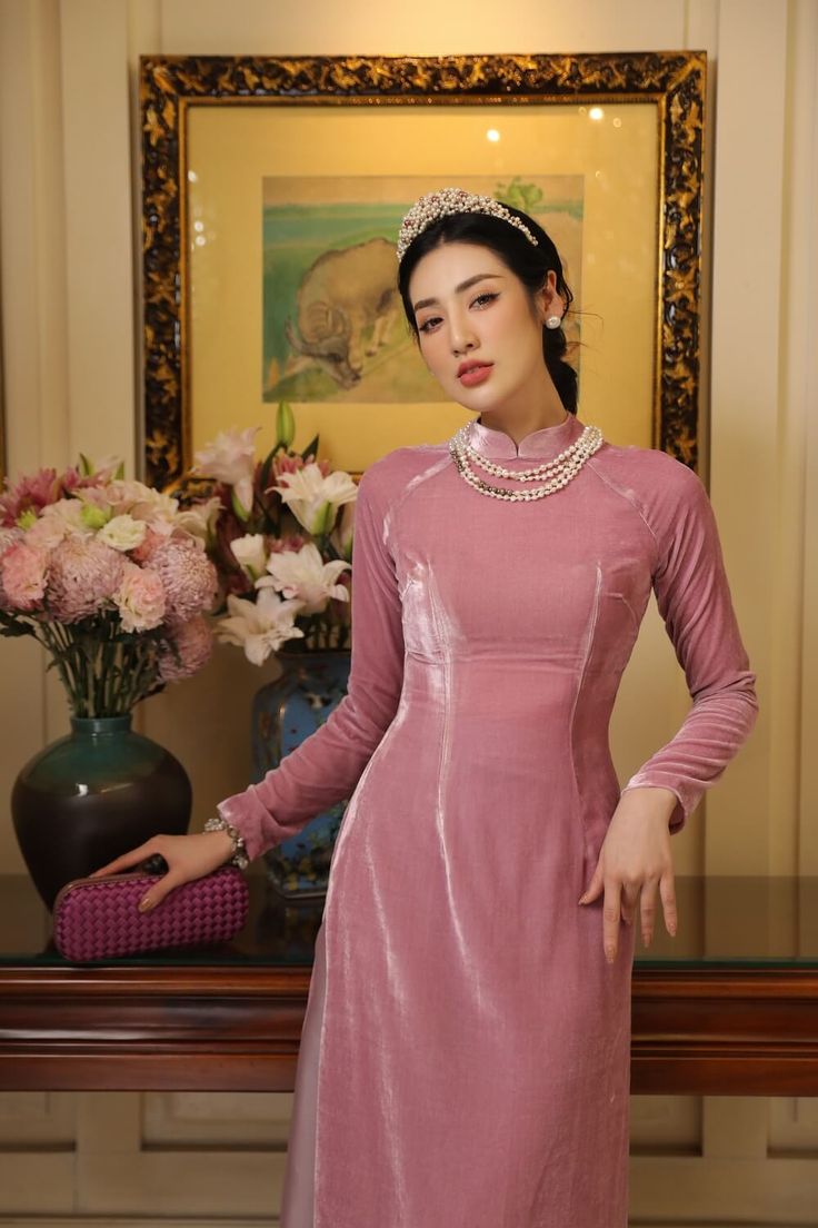 A traditional long sleeves Ao Dai bring a sense of classical with a bit of modern style when it is cleverly used a special velvet material to create a luxurious rough surface and also bring a fervid look to the product. Note:*Processing time takes 15-20 working days (including 10-15 working days for manufacturing and NOT including shipping time)**Made To Order Definition:- The product is currently unavailable and not in mass production.- The product will be manufactured immediately after its ord Indian Wedding Outfits, My My, Steam Iron, Velvet Material, Covet Fashion, Purple Green, Red Purple, S Models, How To Take Photos