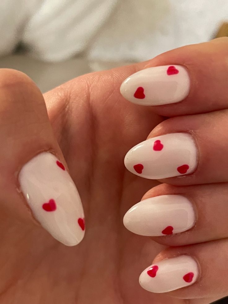 Love Heart Nails Short, Simple White Valentines Nails, White Heart Nails Short, White With Hearts Nails, Red White Nail Designs, Short White Valentines Nails, Short White Nails With Red Heart, Valentines Day Nails White And Red, Valentines Nails For Short Nails