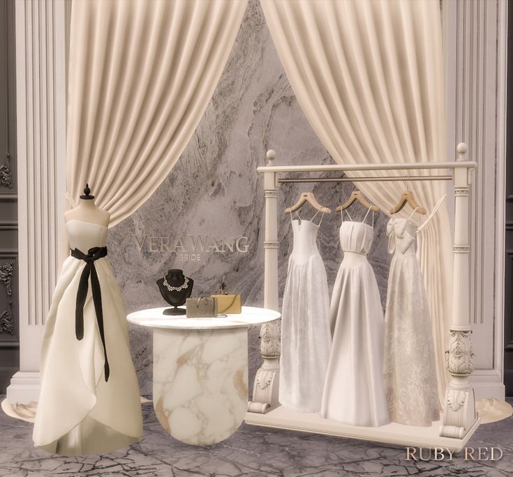 there are three dresses on display in front of a window with drapes and draperies